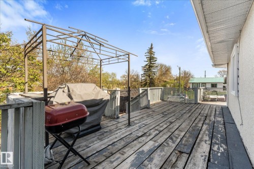 Spacious outdoor deck featuring wood flooring and a perimeter railing - 4759 48 Street, Onoway, AB - Outdoor With Deck Patio Veranda With Exterior