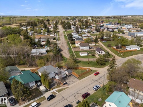 Aerial perspective showcasing a residential area with varied housing styles - 4759 48 Street, Onoway, AB - Outdoor With View