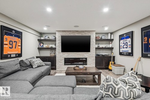 3673 Atkinson Loop, Edmonton, AB - Indoor Photo Showing Living Room With Fireplace