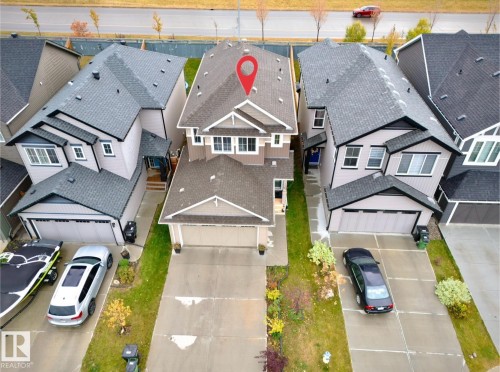 Two-story home with an attached front-facing garage - 1024 Daniels Loop, Edmonton, AB 