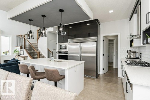 74 Ellice Bend, Fort Saskatchewan, AB - Indoor Photo Showing Kitchen With Upgraded Kitchen