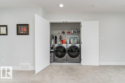 74 Ellice Bend, Fort Saskatchewan, AB - Indoor Photo Showing Laundry Room
