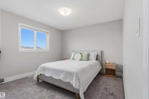 Recessed window featuring white trim and a roller shade - 3312 11 Avenue, Edmonton, AB - Indoor Photo Showing Bedroom
