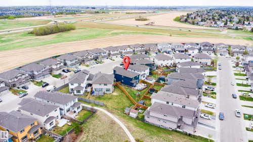 Suburban setting featuring detached homes with varied architectural styles and a mix of single and two-story structures - 3312 11 Avenue, Edmonton, AB - Outdoor With View