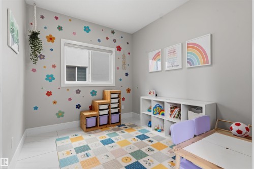 Bright room featuring a window with a white frame, light gray walls, and white tile flooring - 3312 11 Avenue, Edmonton, AB - Indoor