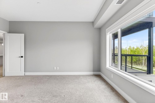 207 7463 May Common, Edmonton, AB - Indoor Photo Showing Other Room