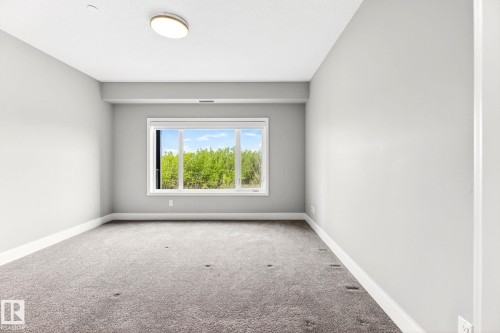 207 7463 May Common, Edmonton, AB - Indoor Photo Showing Other Room