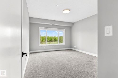 207 7463 May Common, Edmonton, AB - Indoor Photo Showing Other Room