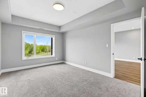 207 7463 May Common, Edmonton, AB - Indoor Photo Showing Other Room