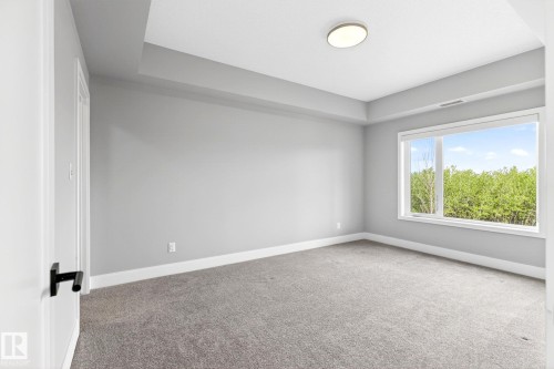 207 7463 May Common, Edmonton, AB - Indoor Photo Showing Other Room