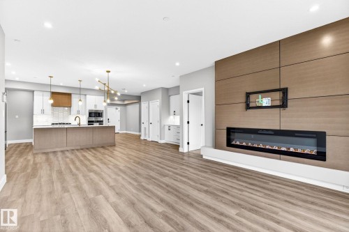207 7463 May Common, Edmonton, AB - Indoor With Fireplace