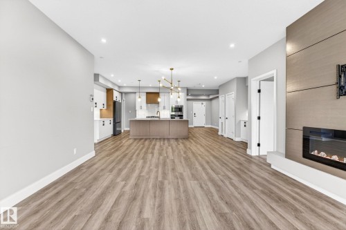 207 7463 May Common, Edmonton, AB - Indoor With Fireplace