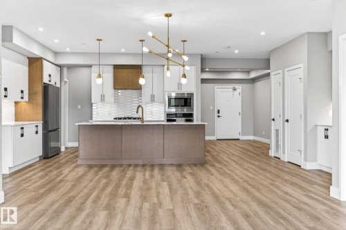 207 7463 May Common, Edmonton, AB - Indoor Photo Showing Kitchen With Upgraded Kitchen