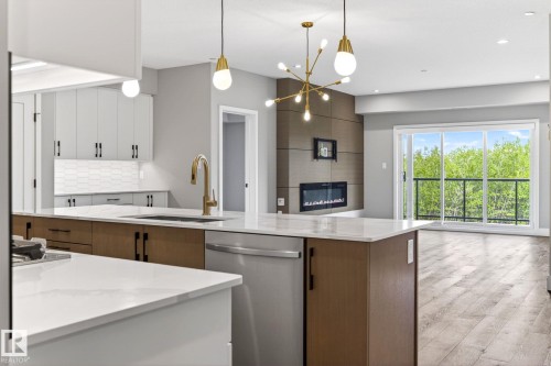 207 7463 May Common, Edmonton, AB - Indoor Photo Showing Kitchen