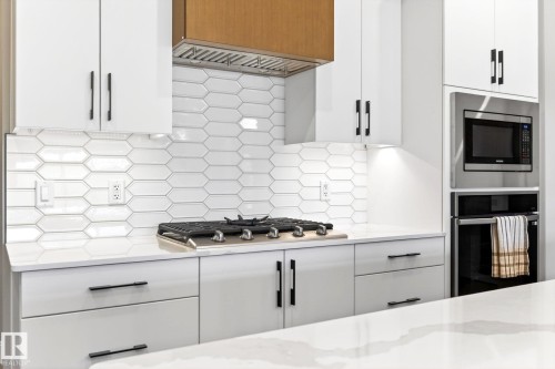 207 7463 May Common, Edmonton, AB - Indoor Photo Showing Kitchen With Upgraded Kitchen