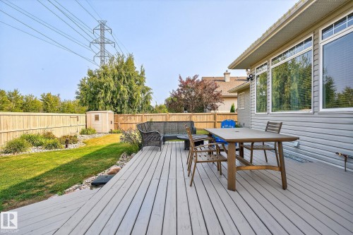Expansive exterior deck featuring durable wood-finish planks - 34 Valleyview Ridge, Fort Saskatchewan, AB - Outdoor With Deck Patio Veranda With Exterior