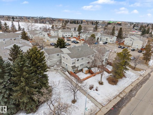 Aerial view of the property and its surrounding area, featuring a neighborhood with residential structures - 6F Castle Terrace, Edmonton, AB - Outdoor With View