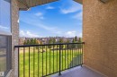 Private balcony with concrete flooring and black metal railing - 407 11453 Ellerslie Road Sw, Edmonton, AB  - Outdoor With Balcony With Exterior 