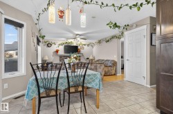 Neutral tone wall paint complements the tiled flooring - 
