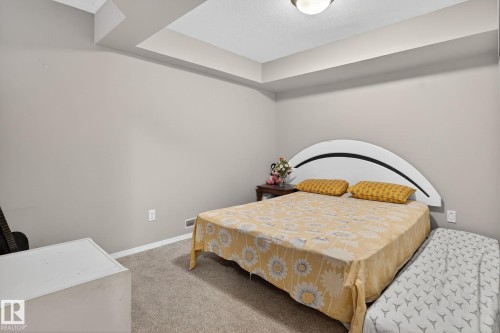 Soft gray walls complementing light carpet flooring - 3912 31 Street, Edmonton, AB 