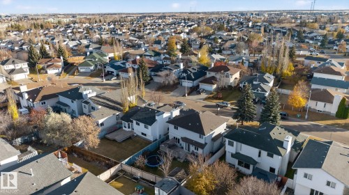Established residential neighborhood featuring a variety of architectural styles, mature trees, and detached properties with private yards - 3912 31 Street, Edmonton, AB 