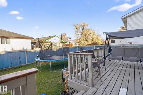 Spacious outdoor deck with wood-finish flooring and railing - 3912 31 Street, Edmonton, AB 