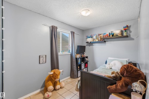 Room with light gray walls, a single window, and tiled flooring - 18648 57 Avenue, Edmonton, AB - Indoor