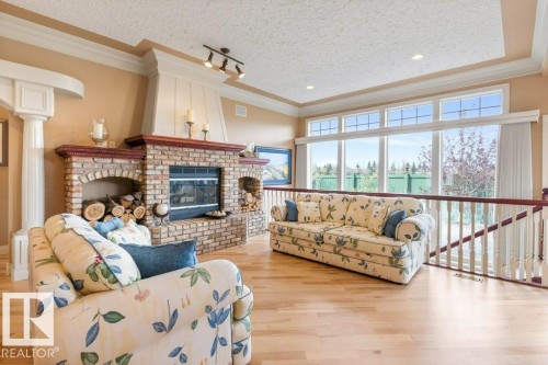 4 Placer Close, St. Albert, AB - Indoor Photo Showing Living Room With Fireplace