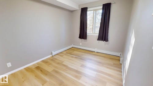 116 11808 22 Avenue Sw, Edmonton, AB - Indoor Photo Showing Other Room