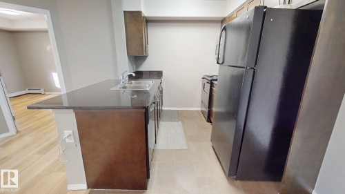 116 11808 22 Avenue Sw, Edmonton, AB - Indoor Photo Showing Kitchen