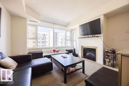 504 2612 109 Street, Edmonton, AB - Indoor Photo Showing Living Room With Fireplace