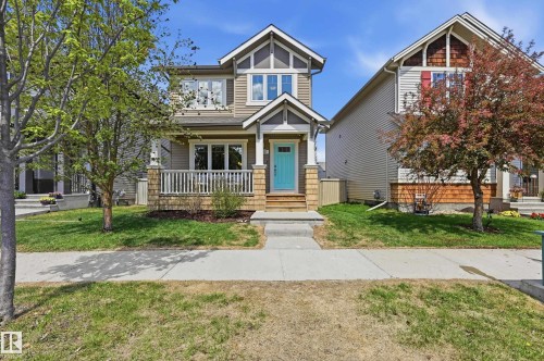 Two-story residence featuring light brown siding and distinct gable accents - 3457 Cutler Crescent, Edmonton, AB - Outdoor With Deck Patio Veranda With Facade