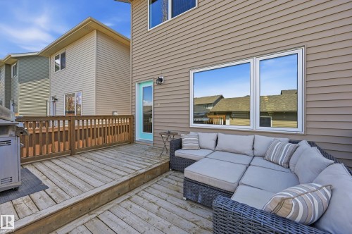 Expansive wood deck with a partial wood railing - 3457 Cutler Crescent, Edmonton, AB - Outdoor With Deck Patio Veranda With Exterior
