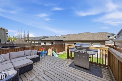 Expansive wood-finish deck with perimeter railing - 3457 Cutler Crescent, Edmonton, AB - Outdoor With Deck Patio Veranda With Exterior