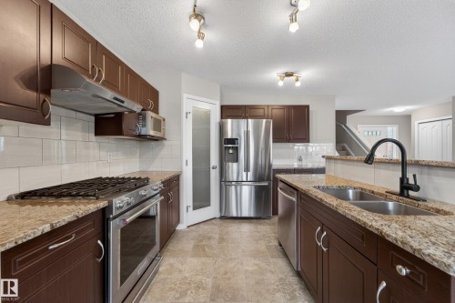 1731 55 Street, Edmonton, AB - Indoor Photo Showing Kitchen With Stainless Steel Kitchen With Double Sink