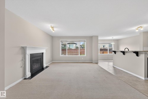1731 55 Street, Edmonton, AB - Indoor Photo Showing Living Room With Fireplace