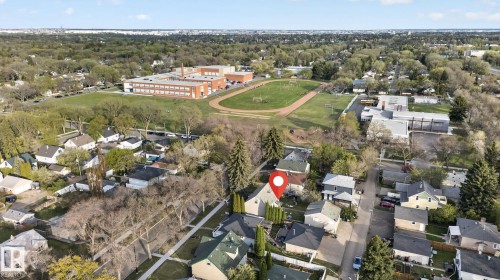 Residential neighborhood featuring a variety of detached homes and mature trees - 11614 70 Street, Edmonton, AB 