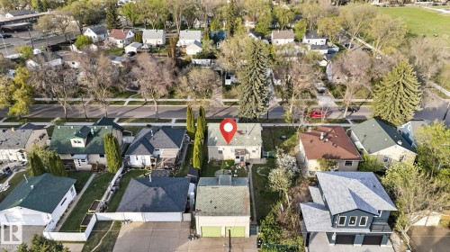 Aerial perspective showcasing a residential property with a detached garage - 11614 70 Street, Edmonton, AB 
