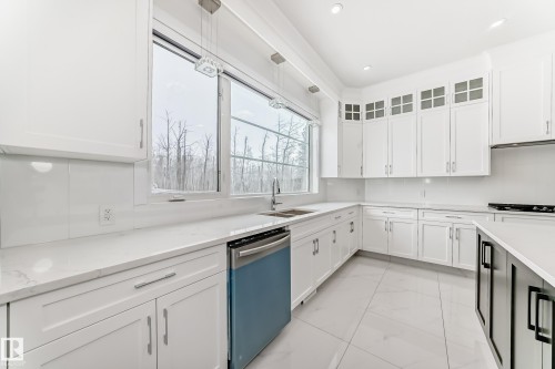 340 33 Ave, Edmonton, AB - Indoor Photo Showing Kitchen With Double Sink
