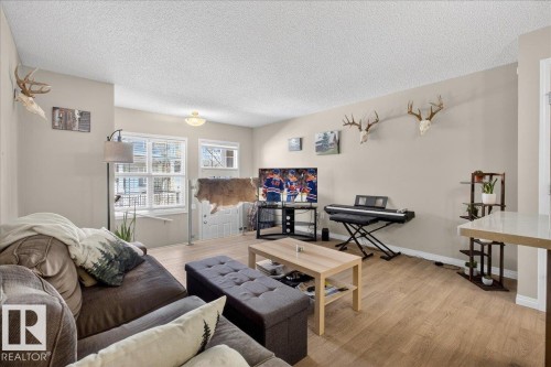 33 4029 Orchards Drive, Edmonton, AB - Indoor Photo Showing Living Room