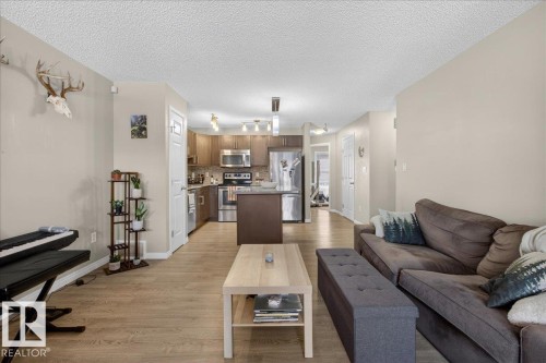 33 4029 Orchards Drive, Edmonton, AB - Indoor Photo Showing Living Room