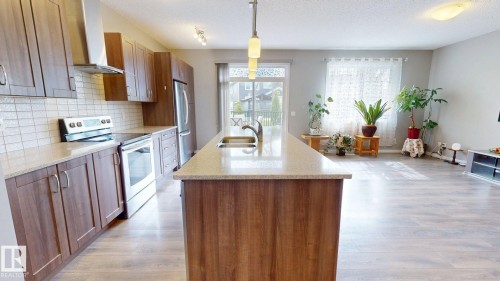 5159 Crabapple Link Sw, Edmonton, AB - Indoor Photo Showing Kitchen With Double Sink With Upgraded Kitchen