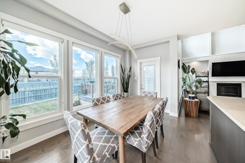 1306 164A Street, Edmonton, AB - Indoor Photo Showing Dining Room With Fireplace