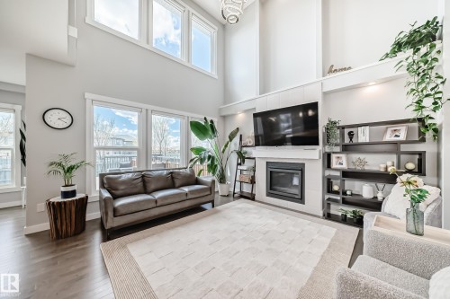 1306 164A Street, Edmonton, AB - Indoor Photo Showing Living Room With Fireplace
