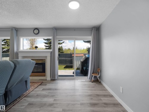 25 501 Youville Drive E, Edmonton, AB - Indoor With Fireplace
