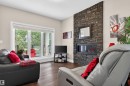 1 1030 Connelly Way, Edmonton, AB  - Indoor Photo Showing Living Room With Fireplace 
