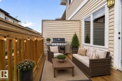 Outdoor deck with natural wood flooring - 