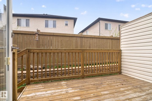 Wood deck with a slatted railing, providing an outdoor extension - 11 450 Mcconachie Way, Edmonton, AB - Outdoor With Exterior