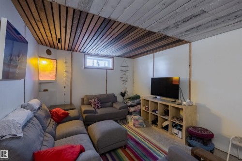 Wood-paneled ceiling with recessed lighting - 5931 138 Avenue, Edmonton, AB - Indoor