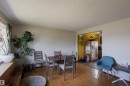 Open floor plan featuring wood-finish flooring - 5931 138 Avenue, Edmonton, AB  - Indoor 